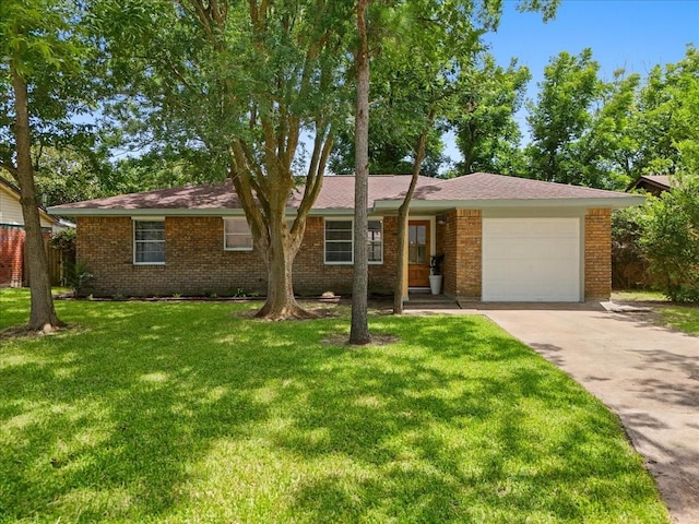2909 15th Ave N, Texas City, TX 77590 - ranch-style home with a garage, driveway, and brick siding