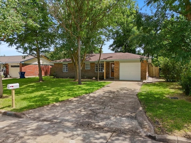 2909 15th Ave N, Texas City, TX 77590 - ranch-style home featuring concrete driveway, a garage, and brick siding