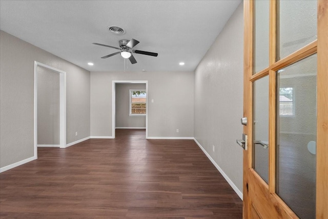 2909 15th Ave N, Texas City, TX 77590 - unfurnished room with dark wood-type flooring, a ceiling fan, and recessed lighting