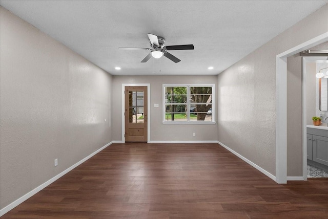 2909 15th Ave N, Texas City, TX 77590 - entrance foyer featuring ceiling fan, wood finished floors, and a textured wall