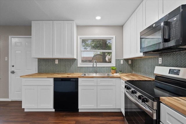 2909 15th Ave N, Texas City, TX 77590 - kitchen with wood counters, black appliances, tasteful backsplash, and recessed lighting