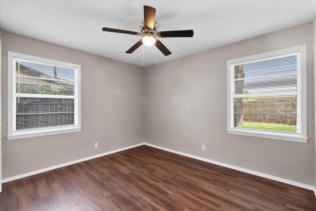 2909 15th Ave N, Texas City, TX 77590 - empty room with dark wood-type flooring and a ceiling fan