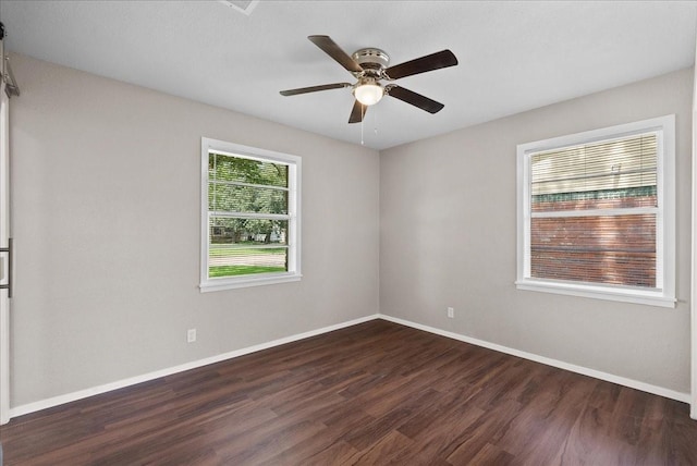 2909 15th Ave N, Texas City, TX 77590 - empty room featuring dark wood-type flooring and ceiling fan