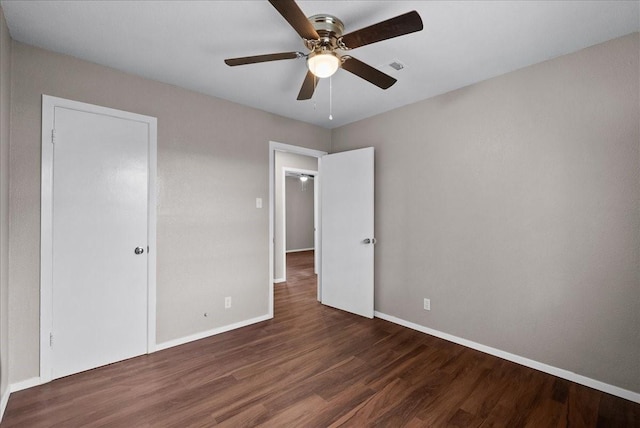 2909 15th Ave N, Texas City, TX 77590 - unfurnished bedroom featuring wood finished floors and a ceiling fan