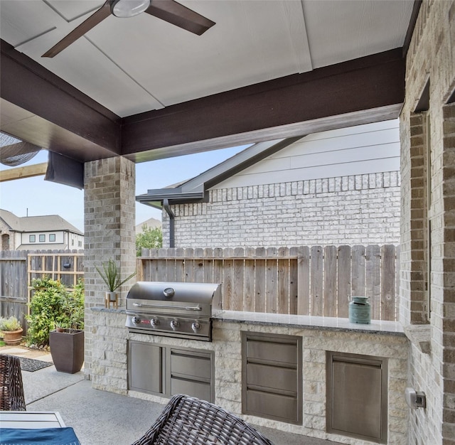 11819 Dockside Shores Dr, Cypress, TX 77433 - view of patio featuring an outdoor kitchen and a ceiling fan