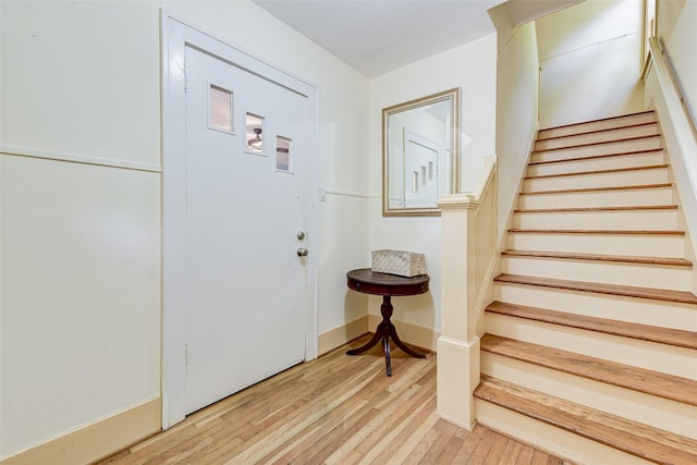 1737 Branard St, Houston, TX 77098 - foyer entrance with stairs and light wood-type flooring