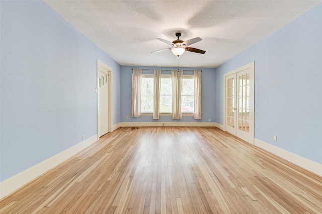 1737 Branard St, Houston, TX 77098 - spare room featuring a ceiling fan and light wood finished floors