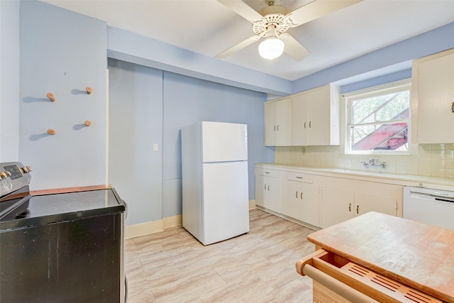 1737 Branard St, Houston, TX 77098 - kitchen featuring white appliances, light countertops, tasteful backsplash, and a ceiling fan