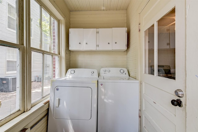 1737 Branard St, Houston, TX 77098 - laundry area featuring independent washer and dryer, cabinet space, and wood ceiling
