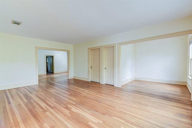 1737 Branard St, Houston, TX 77098 - empty room featuring light wood-type flooring