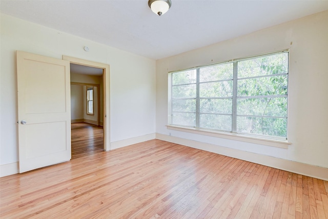 1737 Branard St, Houston, TX 77098 - empty room with light wood-type flooring and plenty of natural light