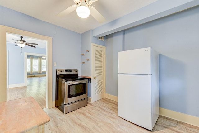 1737 Branard St, Houston, TX 77098 - kitchen with freestanding refrigerator, stainless steel range with electric stovetop, and ceiling fan