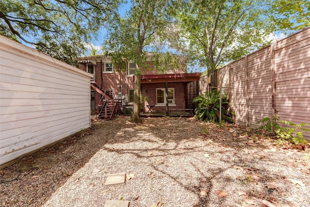 1737 Branard St, Houston, TX 77098 - back of property with brick siding and stairs