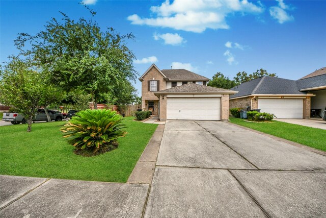 14503 Brackenhurst Ln, Houston, TX 77049 - traditional-style house featuring an attached garage, concrete driveway, and brick siding