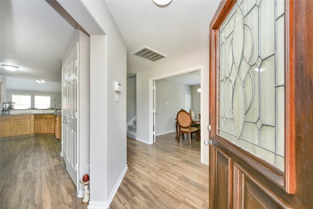 14503 Brackenhurst Ln, Houston, TX 77049 - foyer with stairway and wood finished floors
