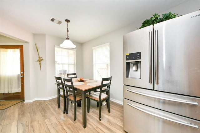 14503 Brackenhurst Ln, Houston, TX 77049 - dining space featuring light wood finished floors and baseboards