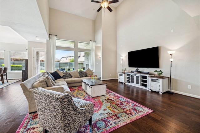 18311 Windspring Falls Ln, Cypress, TX 77433 - living room featuring a ceiling fan, plenty of natural light, dark wood-style flooring, and high vaulted ceiling