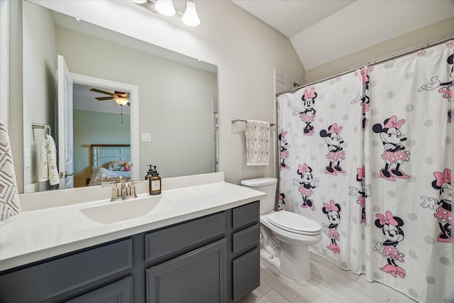 18311 Windspring Falls Ln, Cypress, TX 77433 - full bath featuring vanity, connected bathroom, vaulted ceiling, a shower with curtain, and a ceiling fan