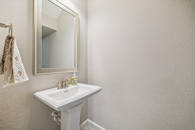 18311 Windspring Falls Ln, Cypress, TX 77433 - bathroom featuring a textured wall