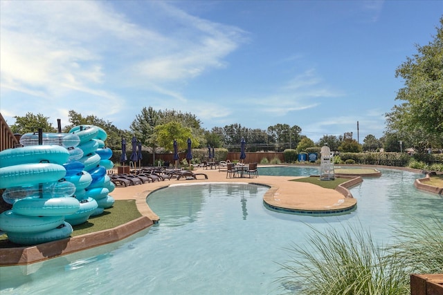 18311 Windspring Falls Ln, Cypress, TX 77433 - community pool with a patio