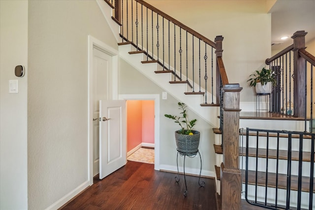 18311 Windspring Falls Ln, Cypress, TX 77433 - stairs with wood finished floors and baseboards