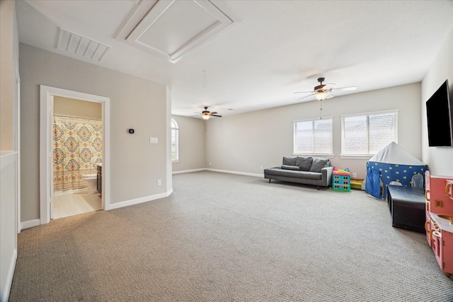 18311 Windspring Falls Ln, Cypress, TX 77433 - living room with attic access, a ceiling fan, and carpet