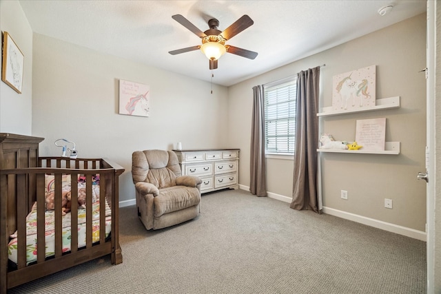 18311 Windspring Falls Ln, Cypress, TX 77433 - carpeted bedroom featuring a crib and ceiling fan