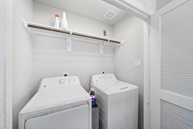 1509 Grayson Oaks Pl, Houston, TX 77043 - washroom featuring washing machine and clothes dryer
