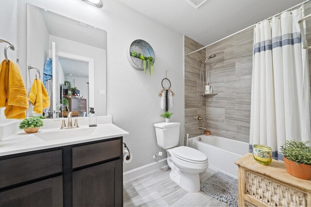 1509 Grayson Oaks Pl, Houston, TX 77043 - bathroom featuring vanity and shower / bath combo with shower curtain