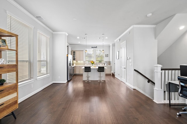1509 Grayson Oaks Pl, Houston, TX 77043 - kitchen featuring stainless steel fridge with ice dispenser, light countertops, a kitchen island, dark wood-style flooring, and crown molding