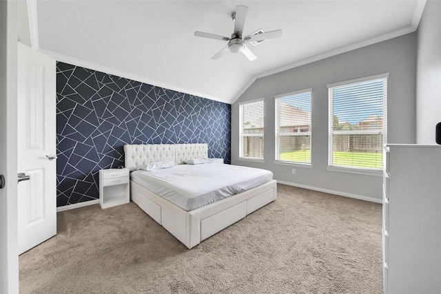 21283 Lily Springs Dr, Porter, TX 77365 - carpeted bedroom with an accent wall, vaulted ceiling, wallpapered walls, ornamental molding, and a ceiling fan