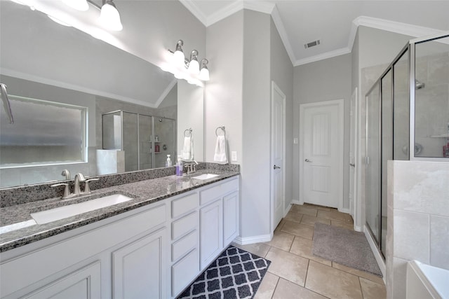 21283 Lily Springs Dr, Porter, TX 77365 - full bathroom featuring double vanity, a shower stall, ornamental molding, and tile patterned flooring