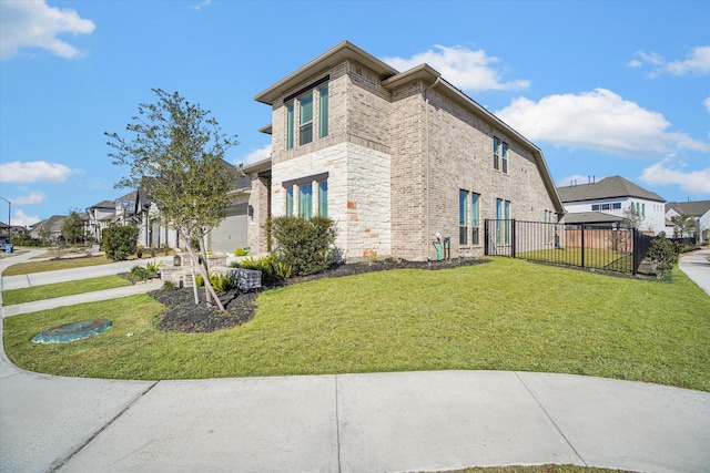 18702 Denio Site Dr, Cypress, TX 77433 - view of side of home with stone siding, a garage, brick siding, and a residential view