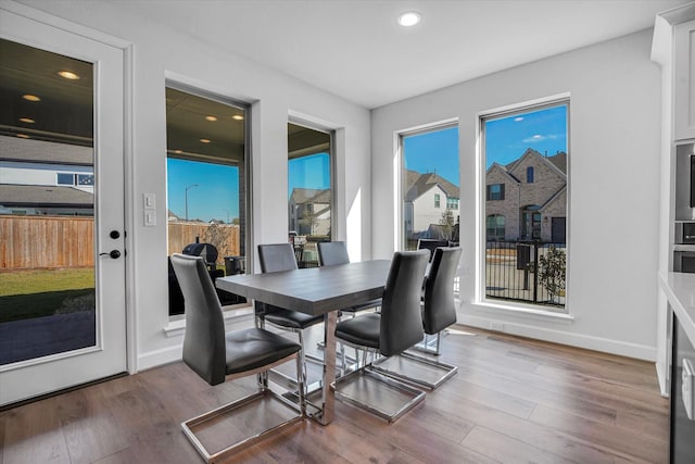 18702 Denio Site Dr, Cypress, TX 77433 - dining room featuring wood finished floors and recessed lighting