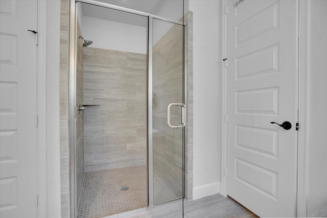18702 Denio Site Dr, Cypress, TX 77433 - full bath with a shower stall and baseboards