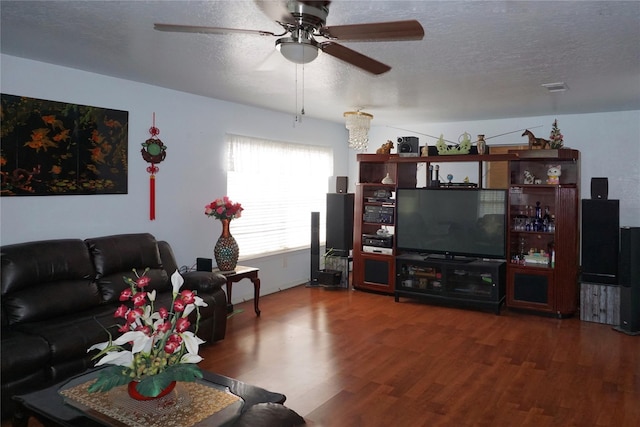12210 Cliffgate Dr, Houston, TX 77072 - living area featuring ceiling fan, wood finished floors, and a textured ceiling