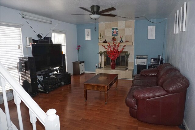 12210 Cliffgate Dr, Houston, TX 77072 - living area with a ceiling fan, wood finished floors, and a textured ceiling