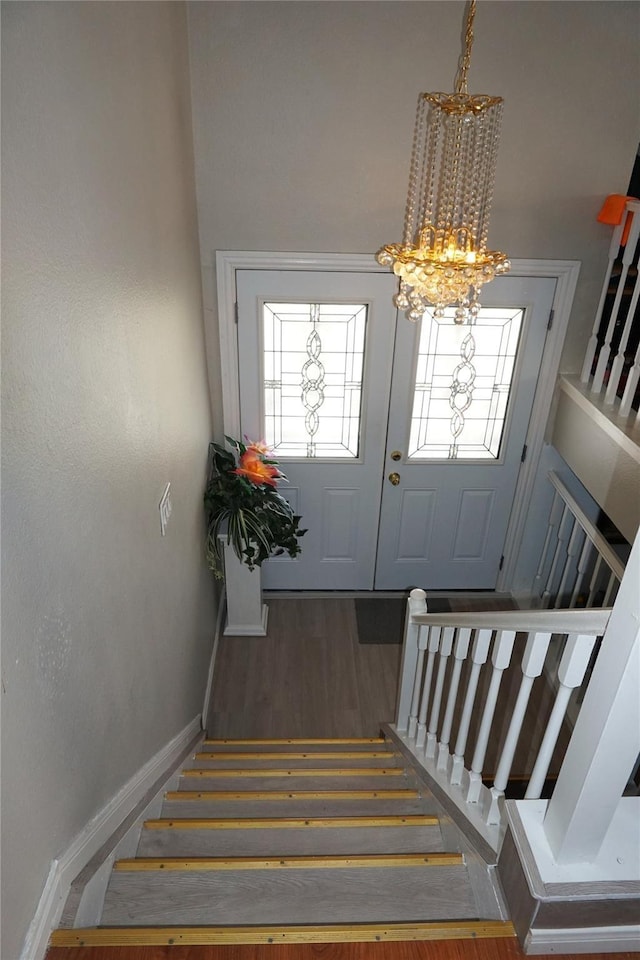12210 Cliffgate Dr, Houston, TX 77072 - foyer entrance featuring stairway, a chandelier, and wood finished floors