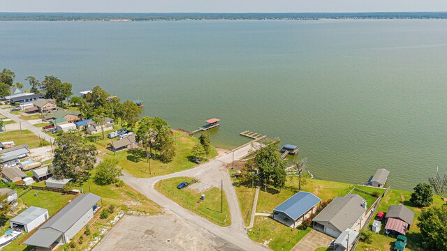 220 Tortuga Way, Point Blank, TX 77364 - aerial view of residential area featuring a nearby body of water