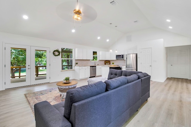 220 Tortuga Way, Point Blank, TX 77364 - living room featuring light wood-style floors, ceiling fan, plenty of natural light, french doors, and recessed lighting