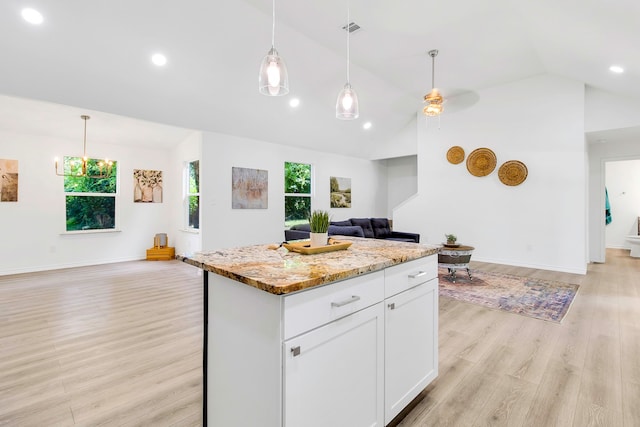 220 Tortuga Way, Point Blank, TX 77364 - kitchen with open floor plan, light wood-type flooring, a center island, pendant lighting, and recessed lighting