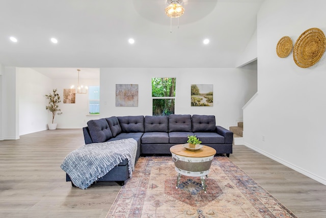 220 Tortuga Way, Point Blank, TX 77364 - living room with wood finished floors, a chandelier, ceiling fan, and recessed lighting