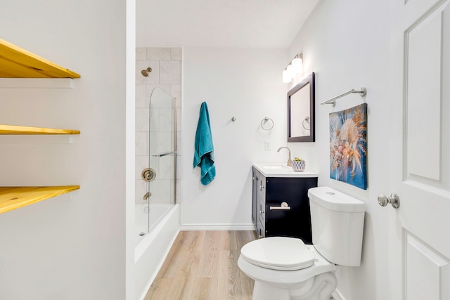 220 Tortuga Way, Point Blank, TX 77364 - full bath featuring vanity, shower / bathtub combination, and wood finished floors