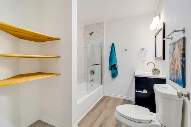 220 Tortuga Way, Point Blank, TX 77364 - bathroom featuring wood finished floors, vanity, and tub / shower combination