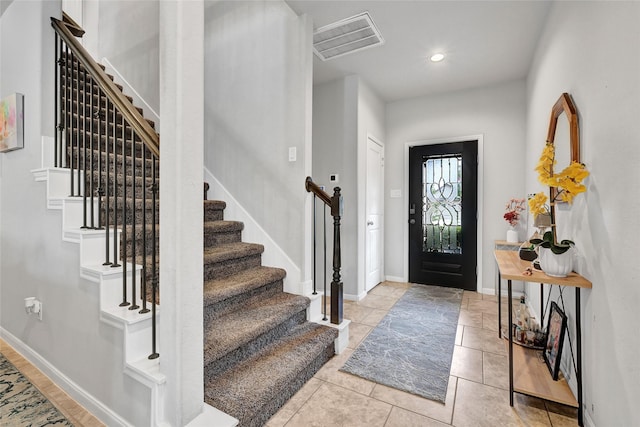 1410 Woods Lake Ct, Houston, TX 77047 - entryway with stairway, recessed lighting, and light tile patterned floors
