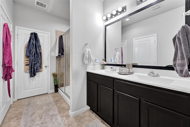 1410 Woods Lake Ct, Houston, TX 77047 - full bathroom featuring double vanity, a shower stall, and tile patterned flooring