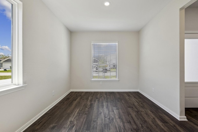 10383 Red Cardinal Dr, Cleveland, TX 77328 - unfurnished room with dark wood-type flooring and recessed lighting