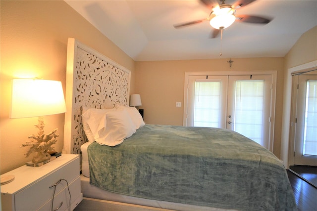 278 Debbie Ln, San Leon, TX 77539 - bedroom with multiple windows, french doors, wood finished floors, vaulted ceiling, and a ceiling fan