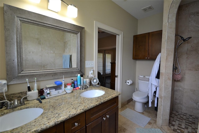 278 Debbie Ln, San Leon, TX 77539 - bathroom with double vanity and a tile shower