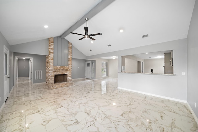 16111 Fan Tail Dr, Crosby, TX 77532 - unfurnished living room with a ceiling fan, a fireplace, light marble finish floors, beamed ceiling, and recessed lighting